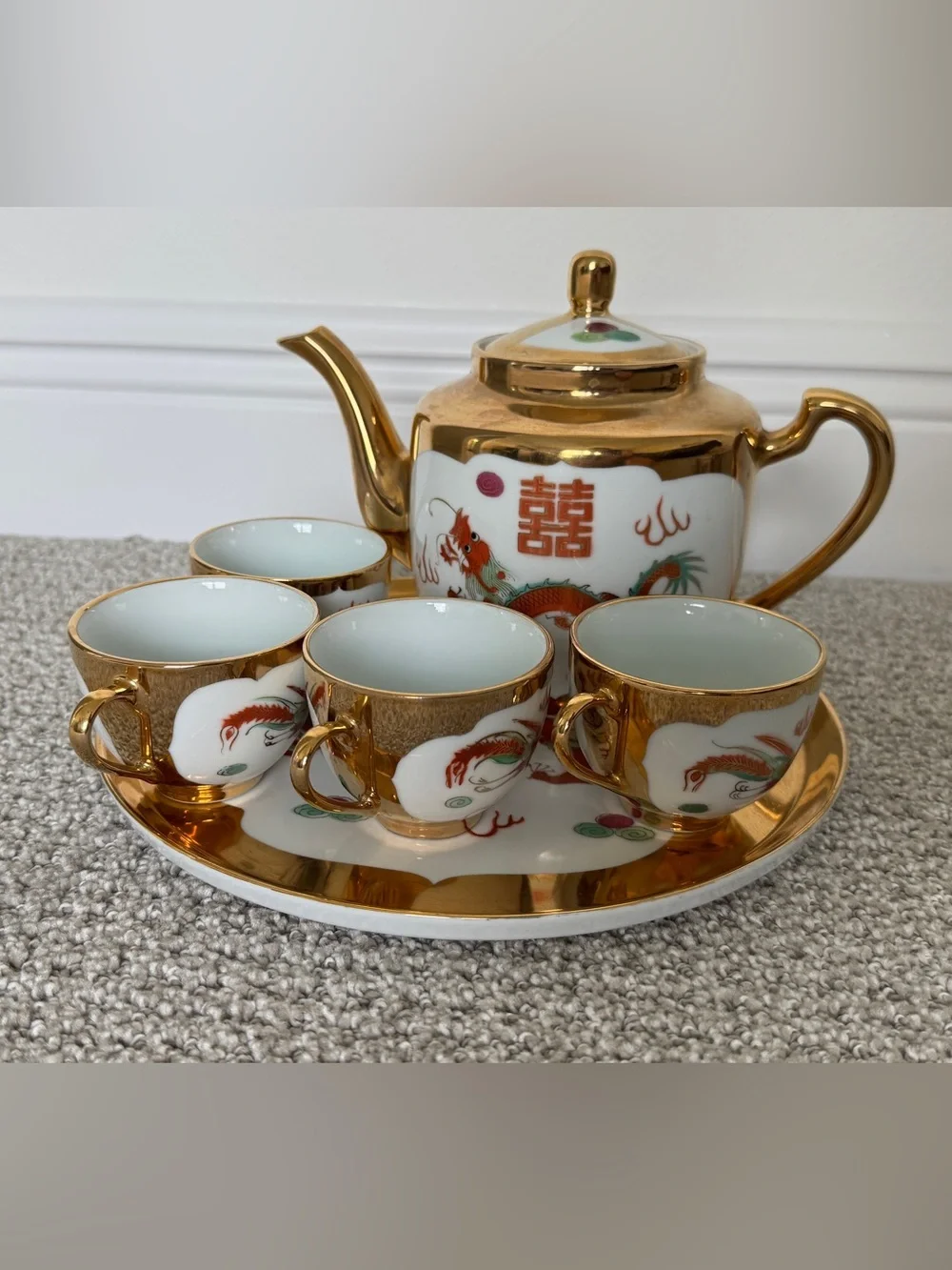 Porcelain tea set with Chinese deagon motifs